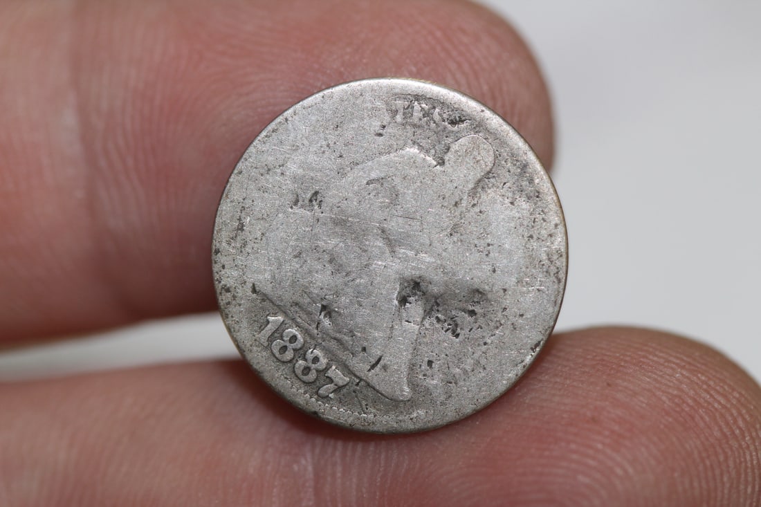 A Cull 1887 Silver dime: as shown
