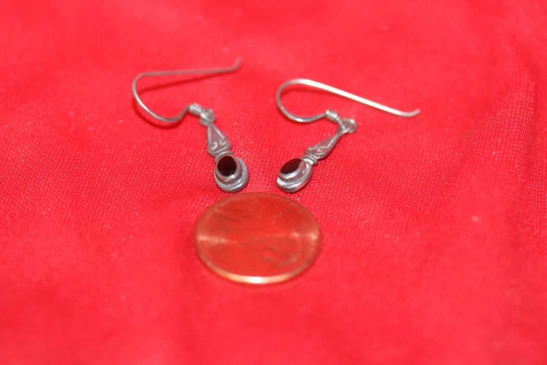 A Pair of Sterling Earrings: as shown