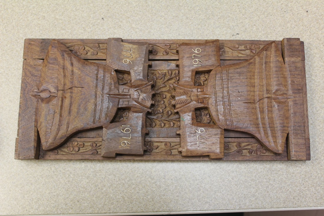 Bicentennial Sliding Book Ends: well carved - exotic wood - maximum extension is about 20 inches