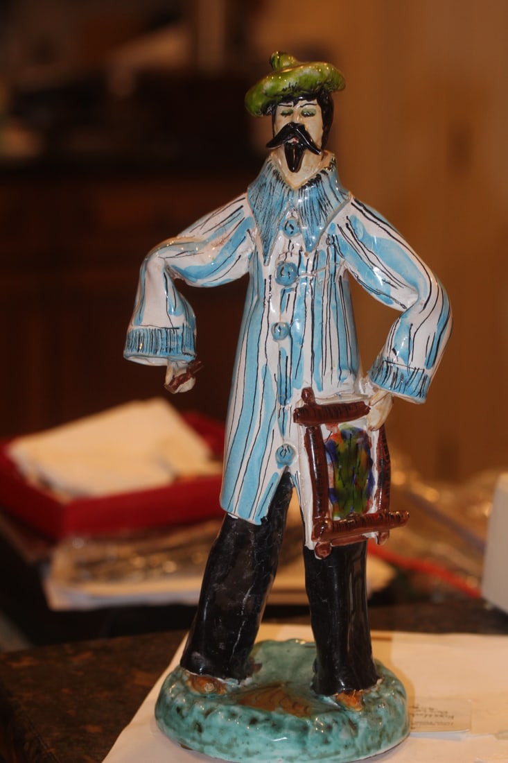Pottery Figure of an Artist: most likely Italian - signed - please note: minor loss as shown - 12 1/2" tall