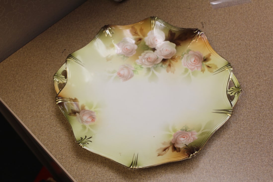 R.S. Prussia Two Handle Plate: 11" in diameter - rose pattern - unusual design