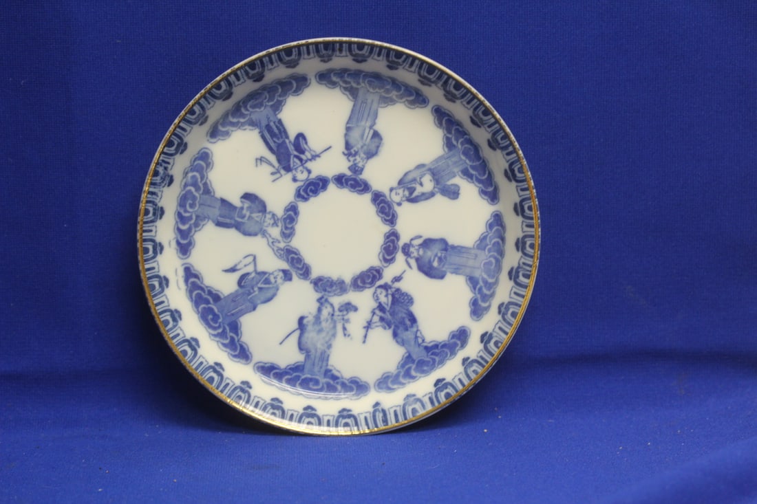 8 Oriental Immortals: possibly Japanese - blue and white - 7 3/8" in diameter