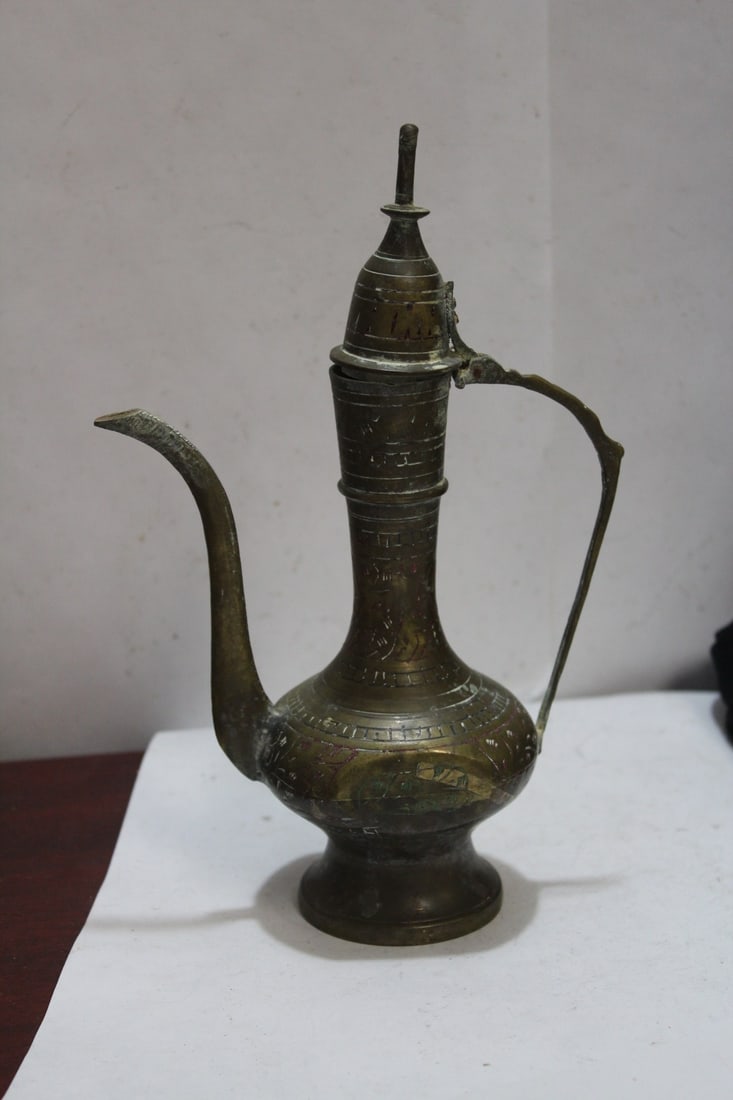 A Vintage Brass Teapot: Middle East - 8 3/4" tall