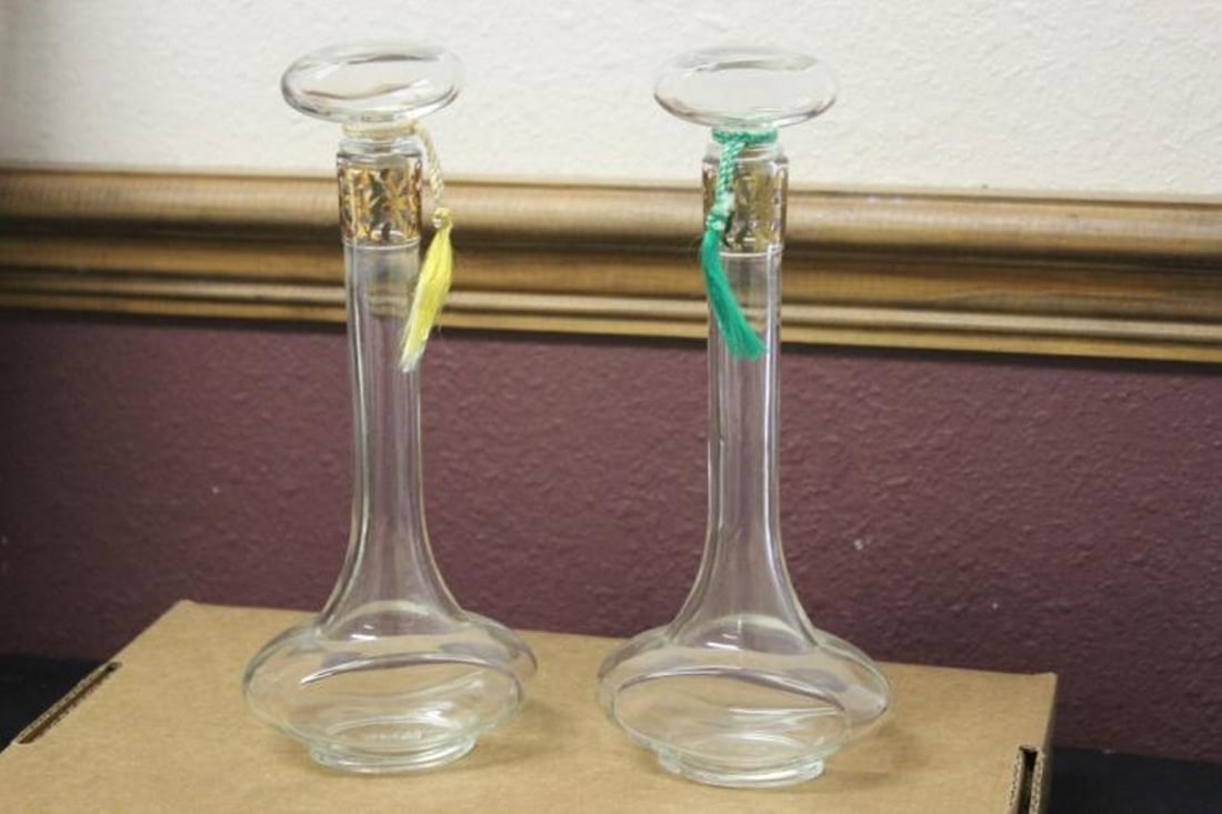 A Pair of Avon Parfume Bottles: 9" tall