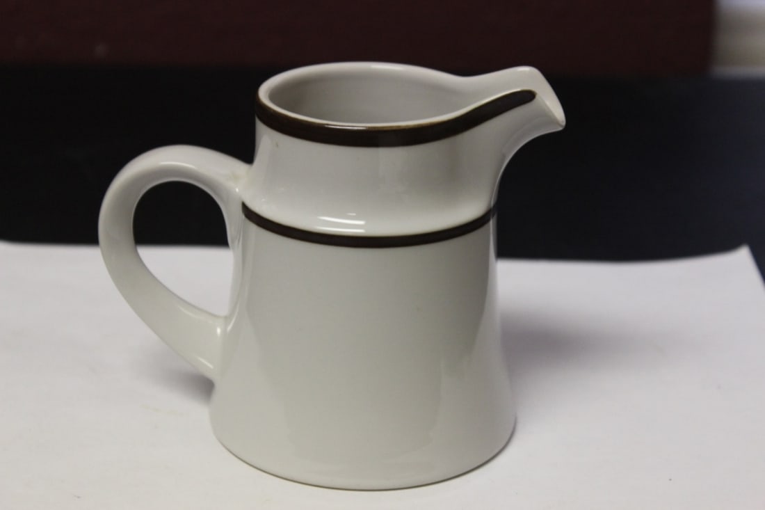 A Noritake Stonecarve Pitcher: Possibly a creamer - 4 1/2 inches tall