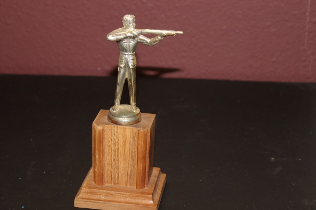 A Metal Statue on Wooden Base: Looks to be cast metal - overall= 7 3/4 inches tall