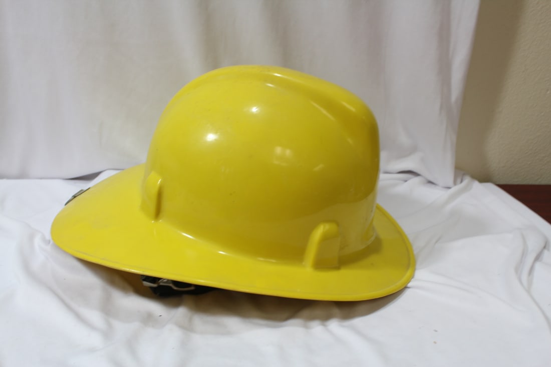 A Vintage Fireman Helmet: 14 1/2" across