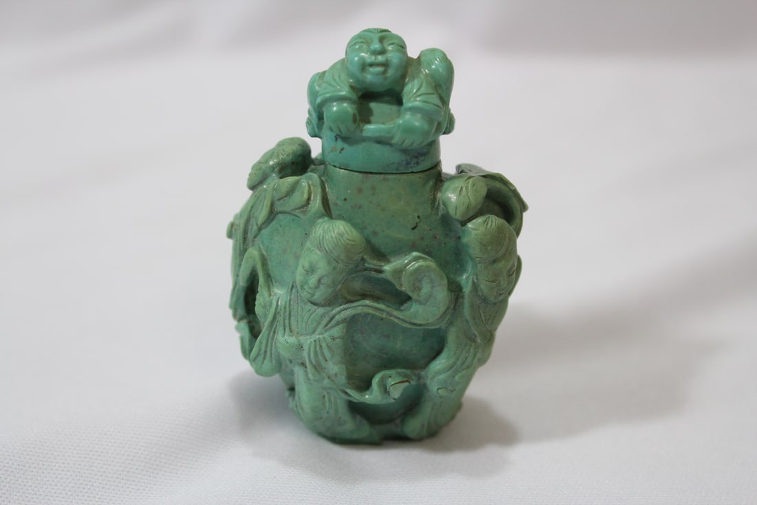 An Antique Chinese Carved Turquoise Snuff Bottle: 2 5/8" tall - please note: spoon broke off