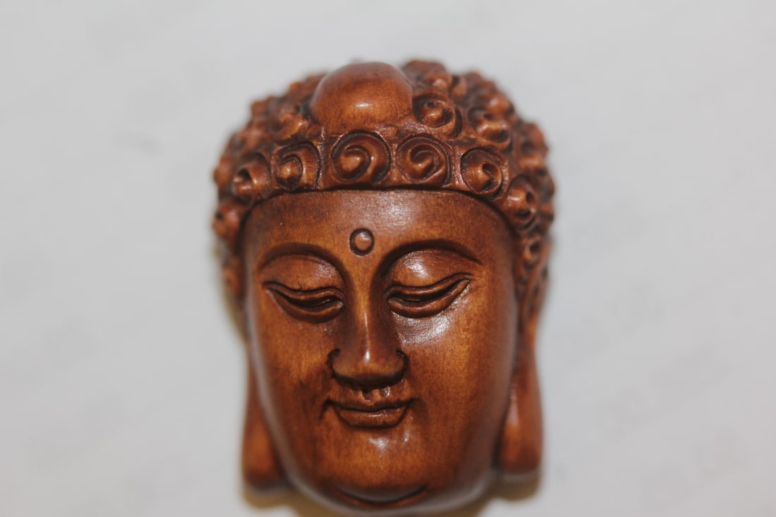 A Signed Japanese Wooden Ojimie Kwan Yin Head: very nice carving