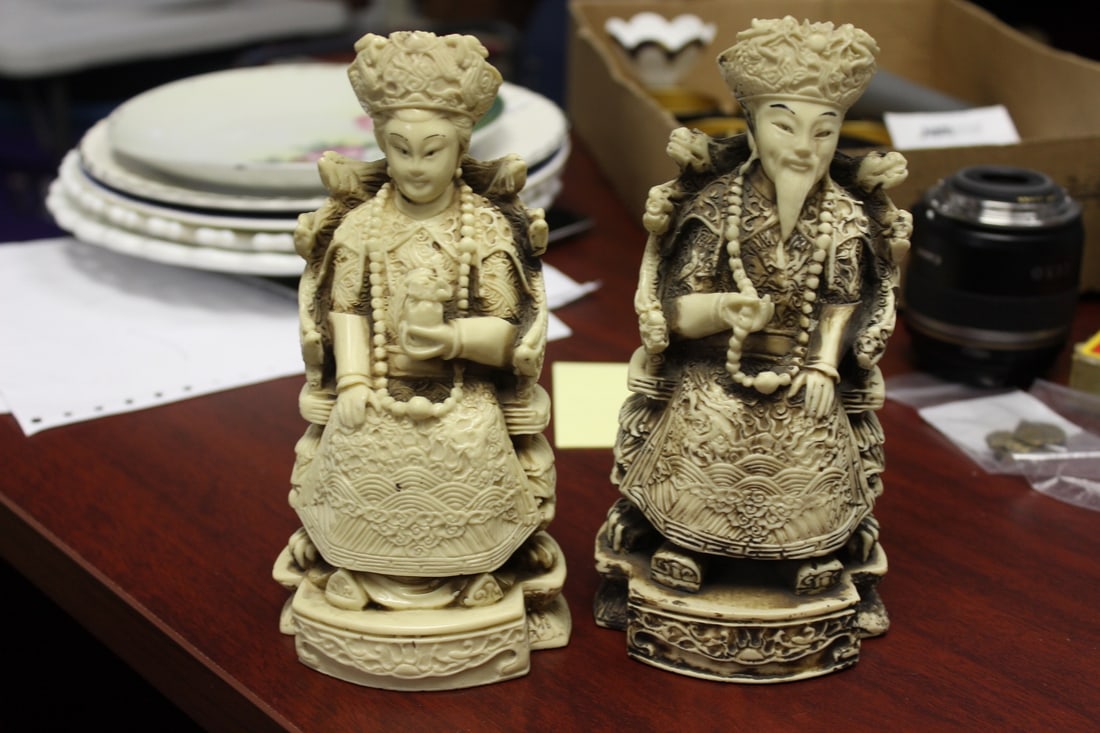 An Emperor and Empress Figurine: Chinese - one signed - resin construction - well carved - both finial were missing - taller=7 3/4"