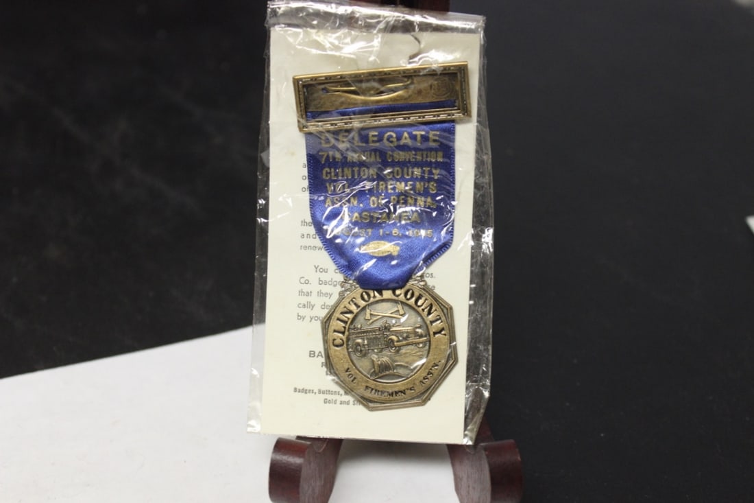 A Clinton County Fireman's Association Medal: Delegate medal with paperwork