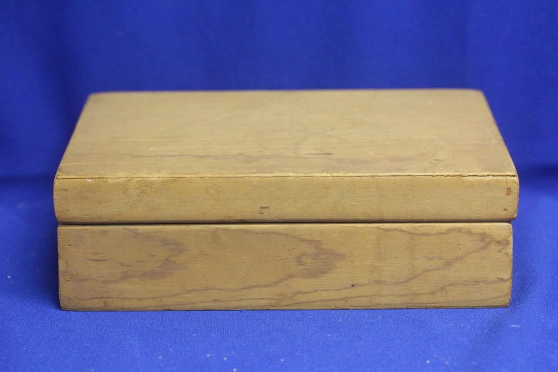 A Wooden Box: 8 3/4" across