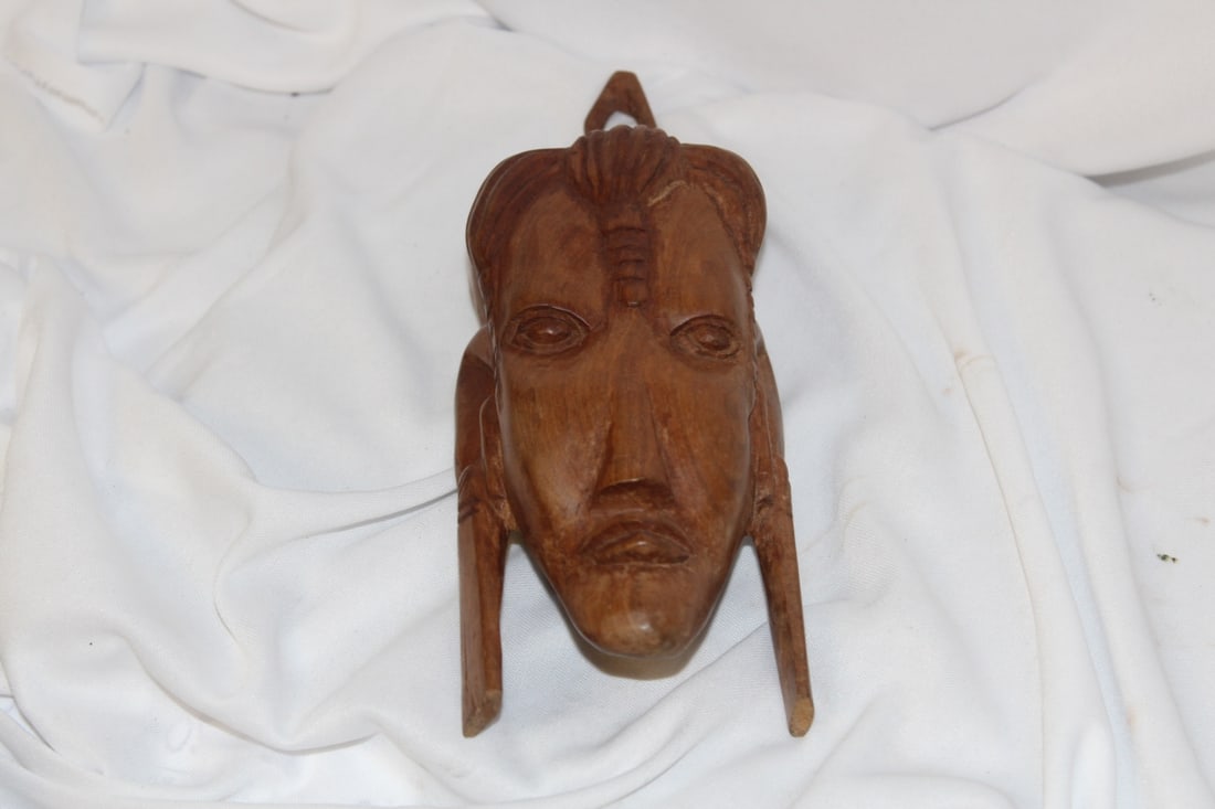 A Wooden Face Wall Hanger: Most likely African - 8" long - solid wood