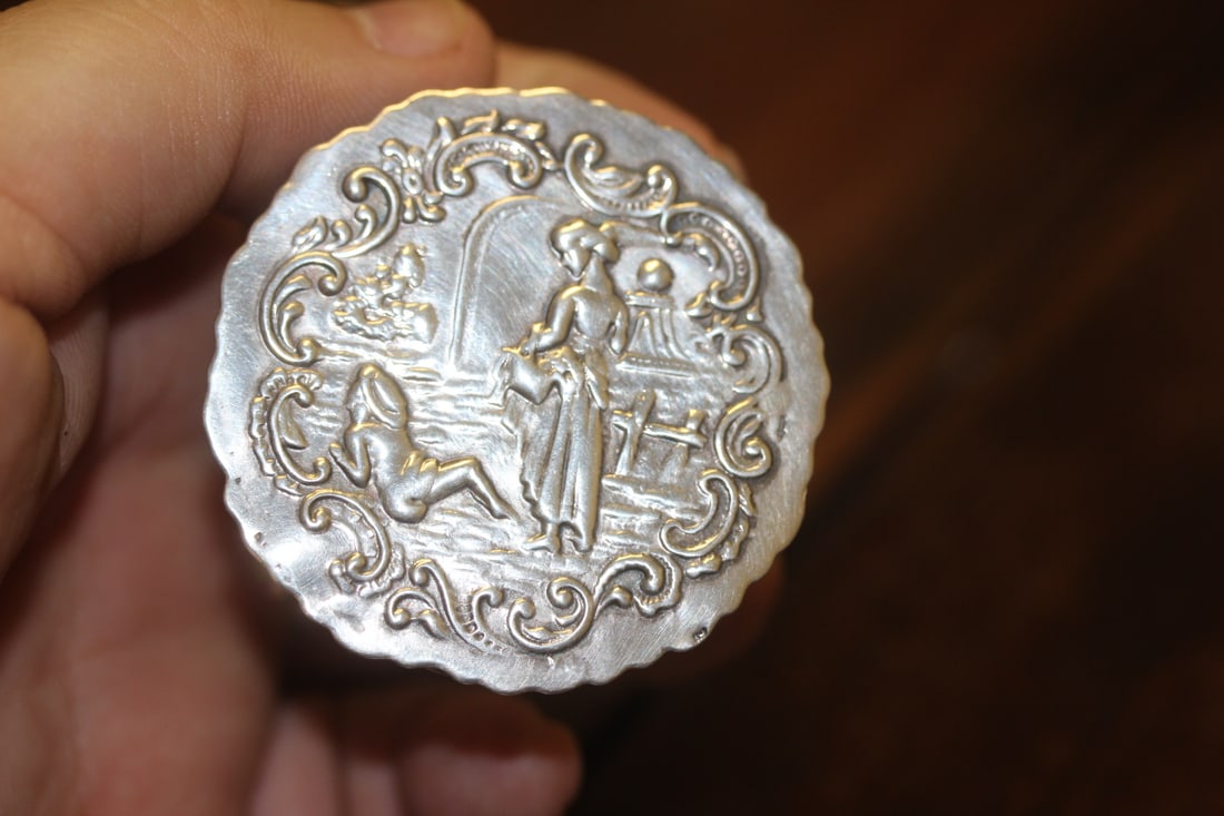 A Miniature Sterling Repousse Table - 2