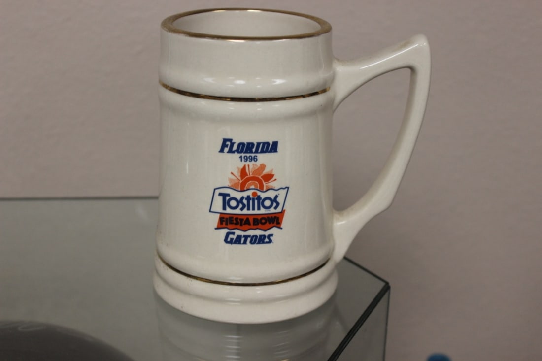 A Florida 1996 Tostitos Fiesta Bowl Gators Mug: 5 5/8 inches tall