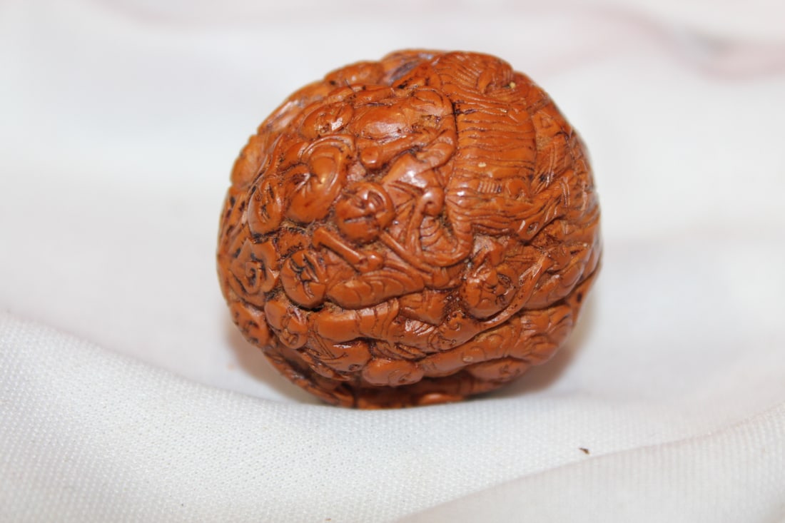 A Nicely Carved Walnut: as shown