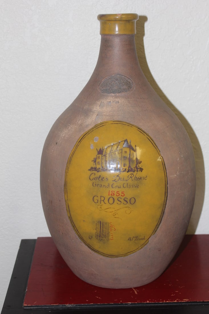Grand Cru Classic Grosso Jug: have a museum stock number on bottom - exact age unknown - 15 1/4" by approximately 8" wide - please note: chip on lip of jug as shown