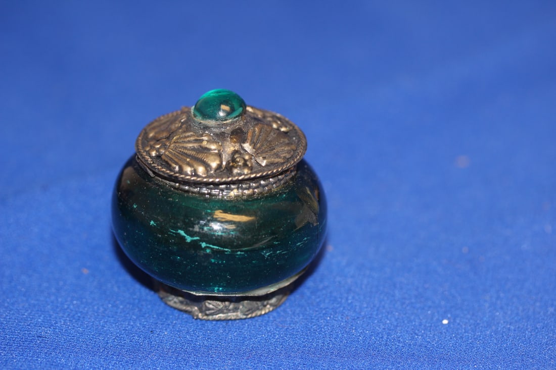 An Oriental Glass and Metal Trinket Box: 2 inches in diameter