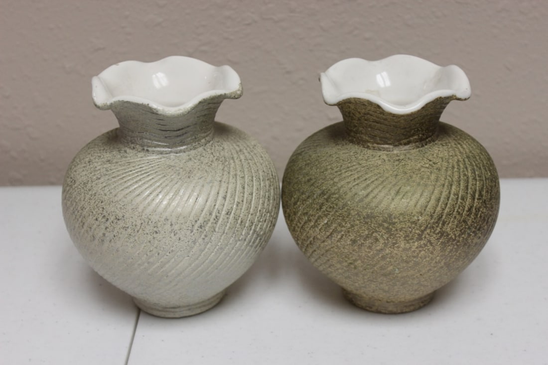 A Shawnee Pair of Swirl with Gold Splatter Vases: 6 inches tall and 4.5 inches at the widest point
