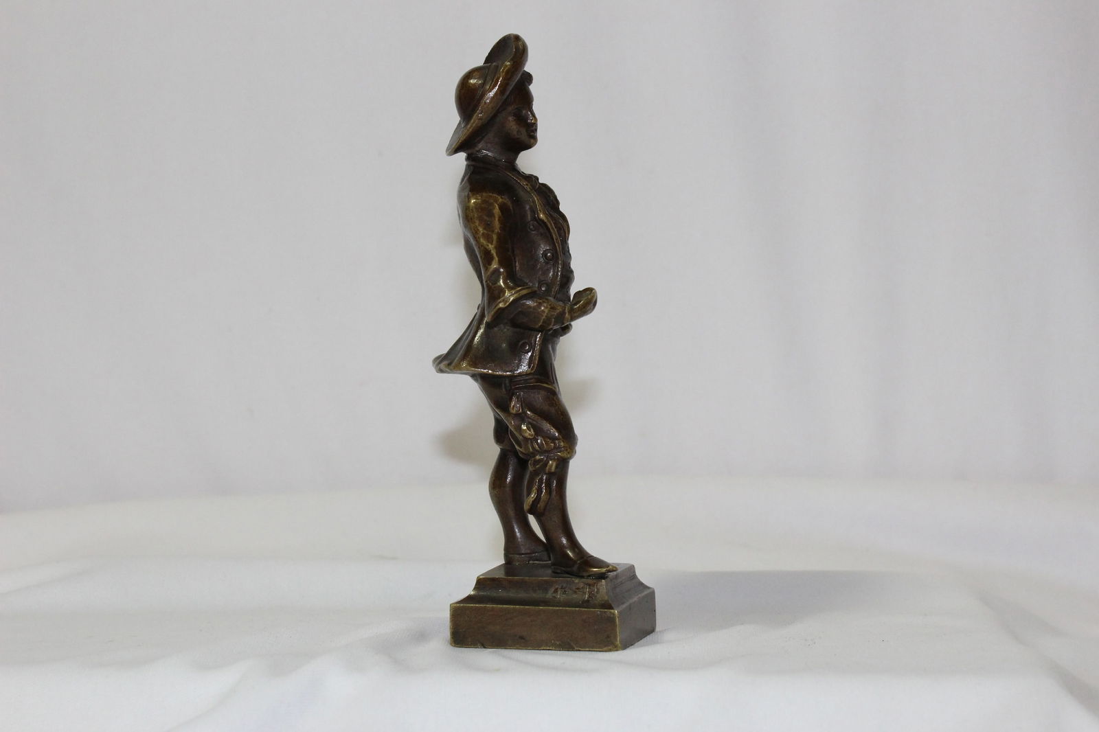A Solid Bronze Boy Figurine - 4