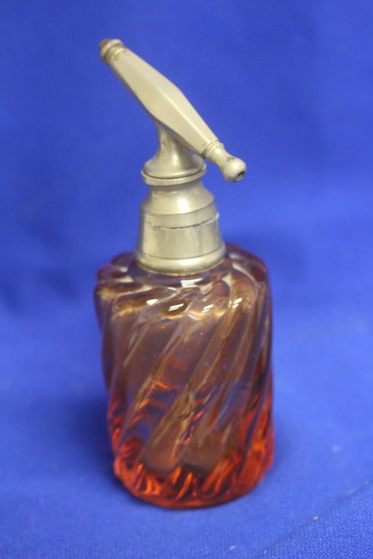 Orange Glass Atomizer: twisted design - please note= device= crack as shown, needs a new one - 5 3/8" tall