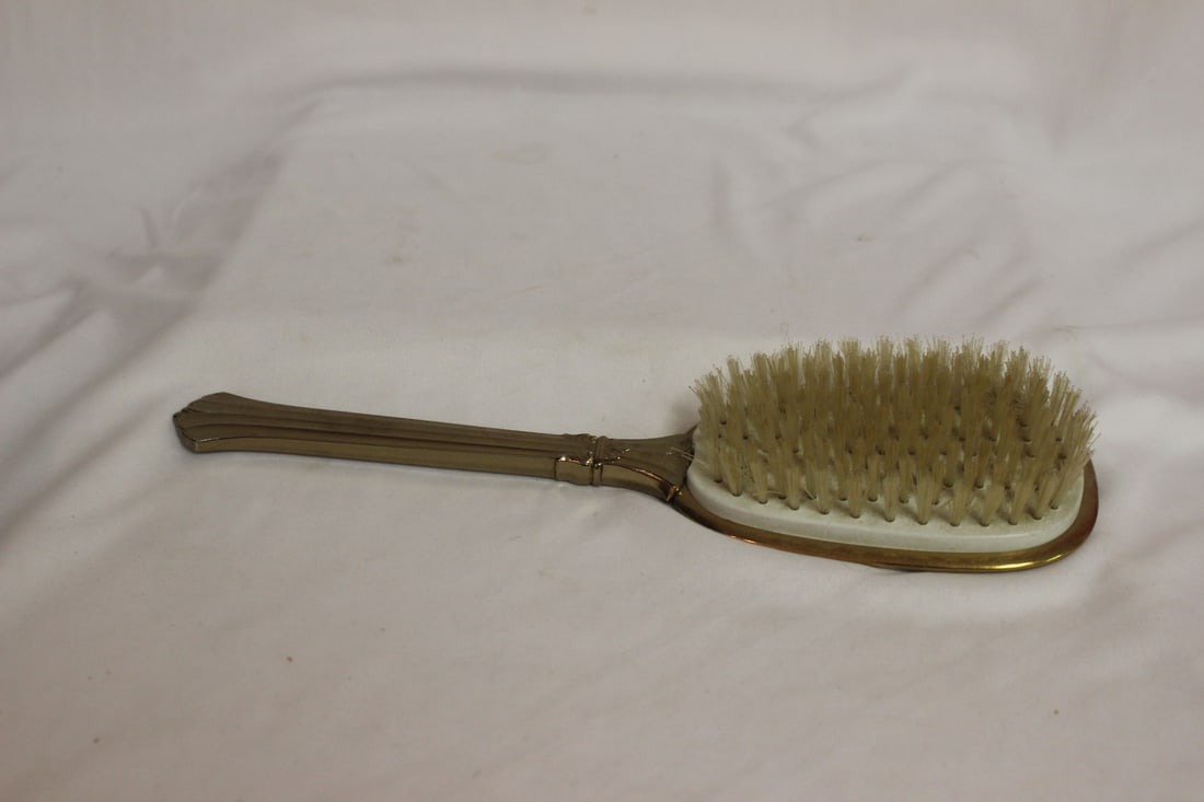 A Vintage Hair Brush: 10 1/4" long
