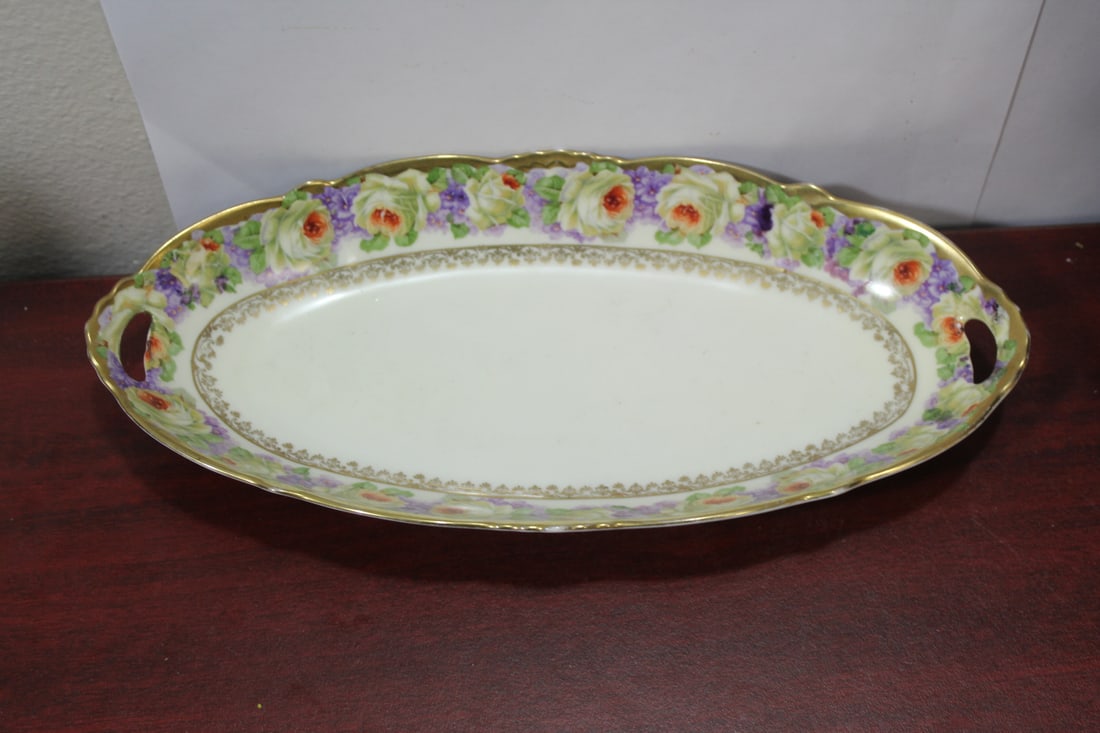 A Vintage Vegetable Dish: with 2 handles - 11 3/4" across