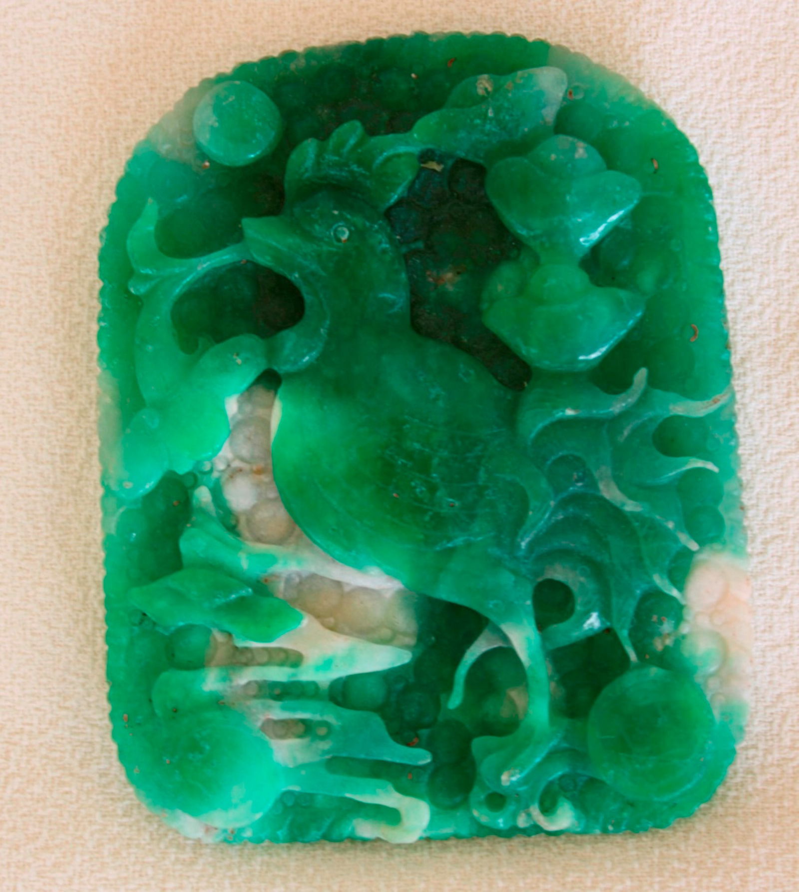 Jadeite Plaque with a Bird Motif: 4 3/8" by 3 3/8".