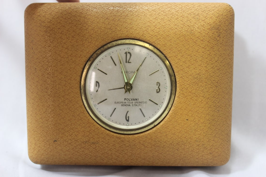 An Europa Traveling Clock: appears to be working, but accurancy unknown - 5 3/4" x 4 5/8"