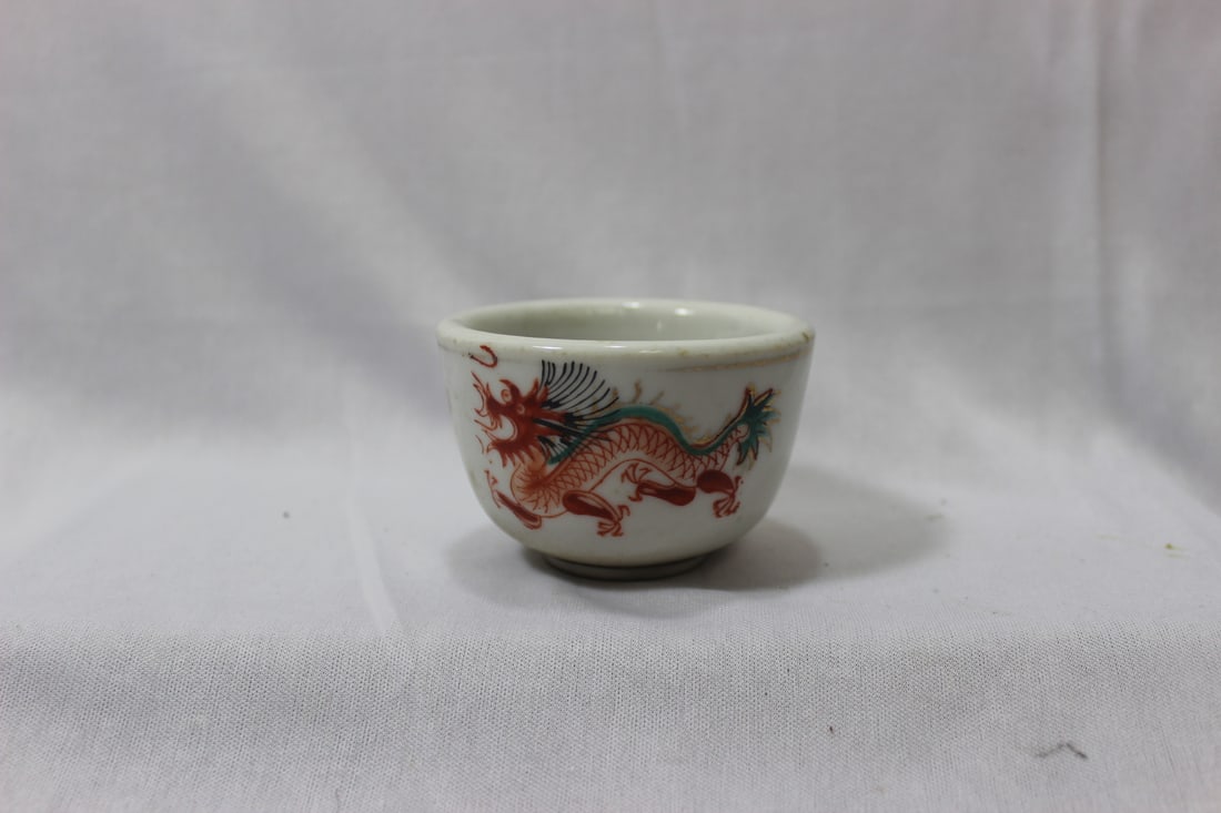 A Vintage Chinese Teacup: dragon design - 3 inches in diameter