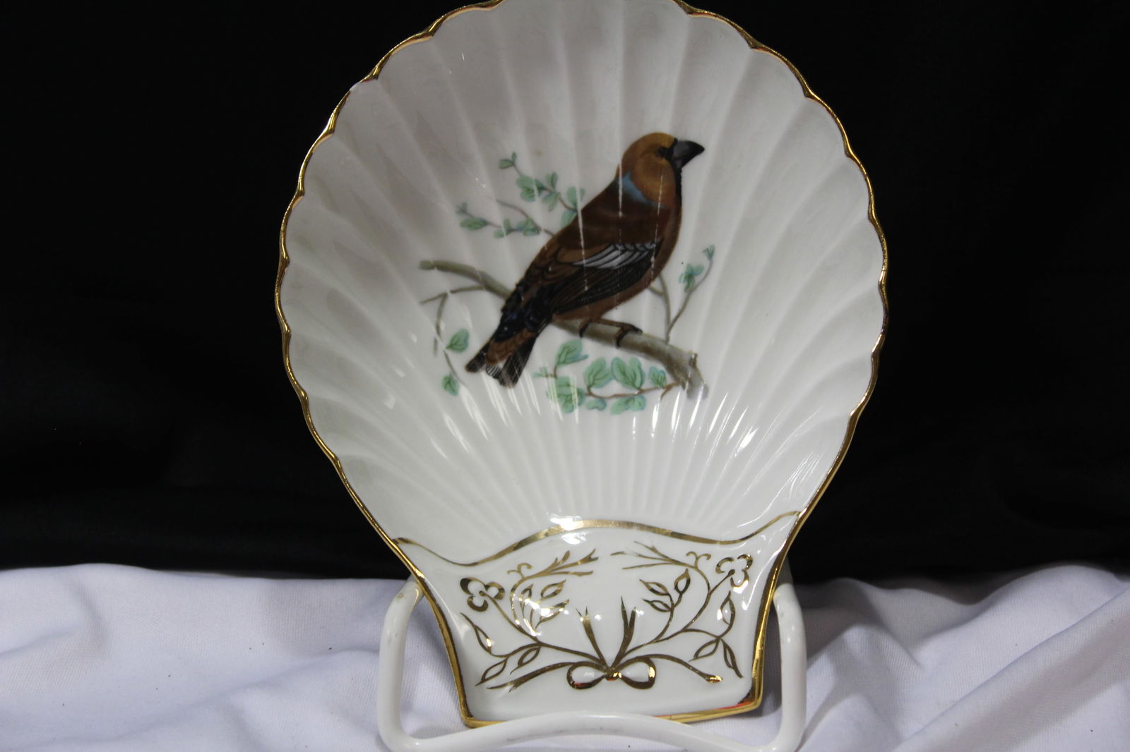 Fireproof Porcelain Dish: Lourioux Le Faune Shell Shape dish - bird motif - 6 5/8" across - please note: small chip