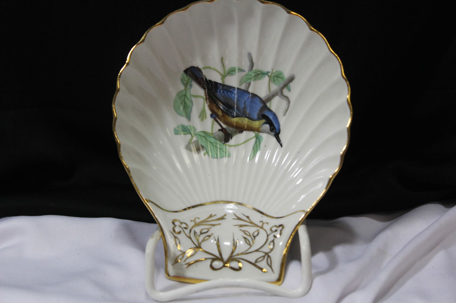 Fireproof Porcelain Dish: Lourioux Le Faune Shell Shape dish - bird motif - 6 5/8" across