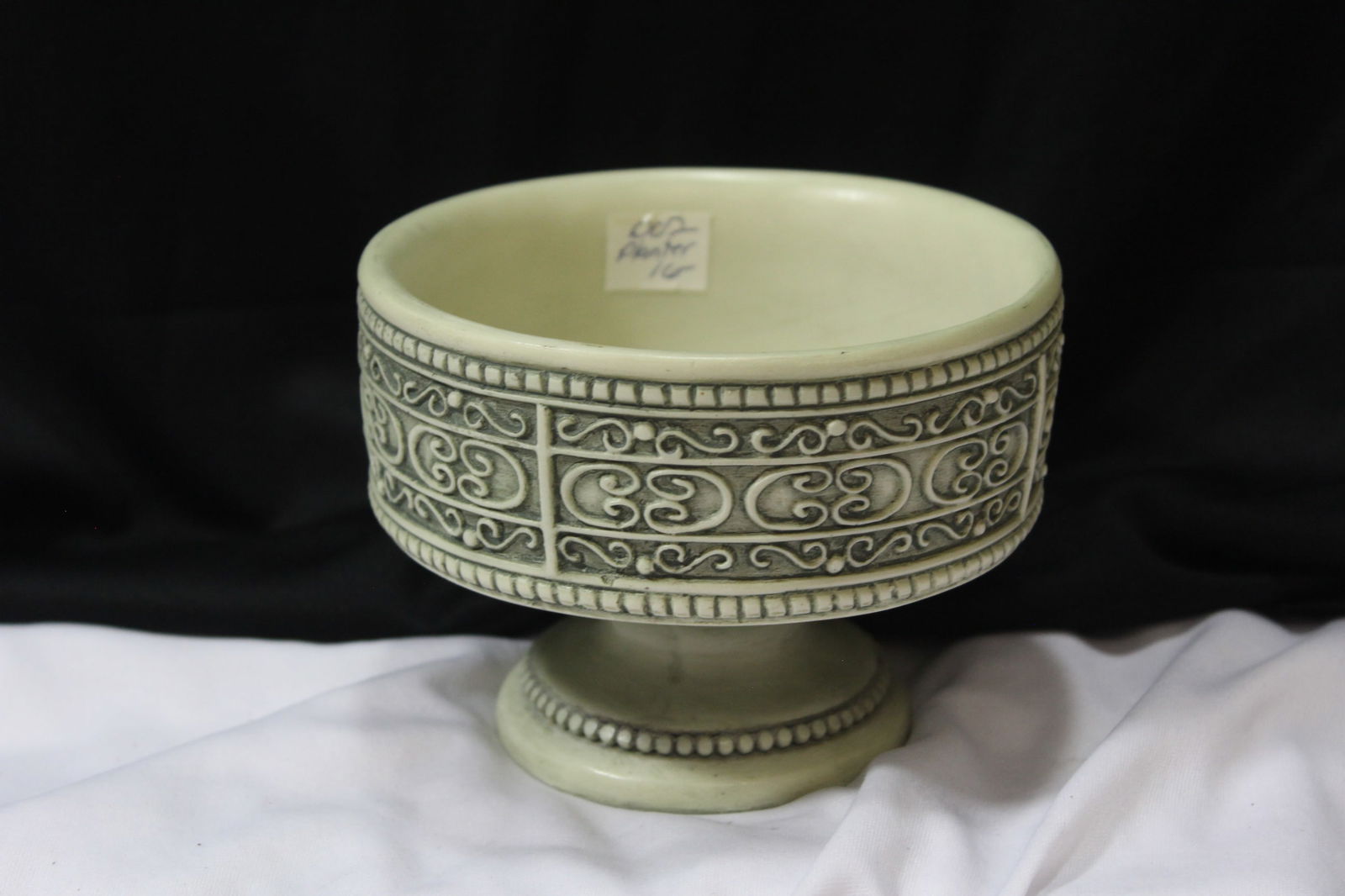 A Resin Bird Feeder?: 5 1/8" in diameter