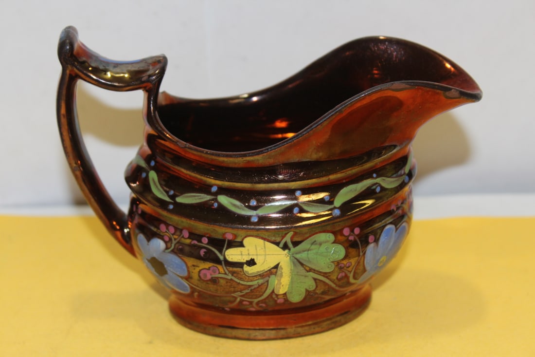 A Ceramic Lusterware Creamer: 5 3/8" across