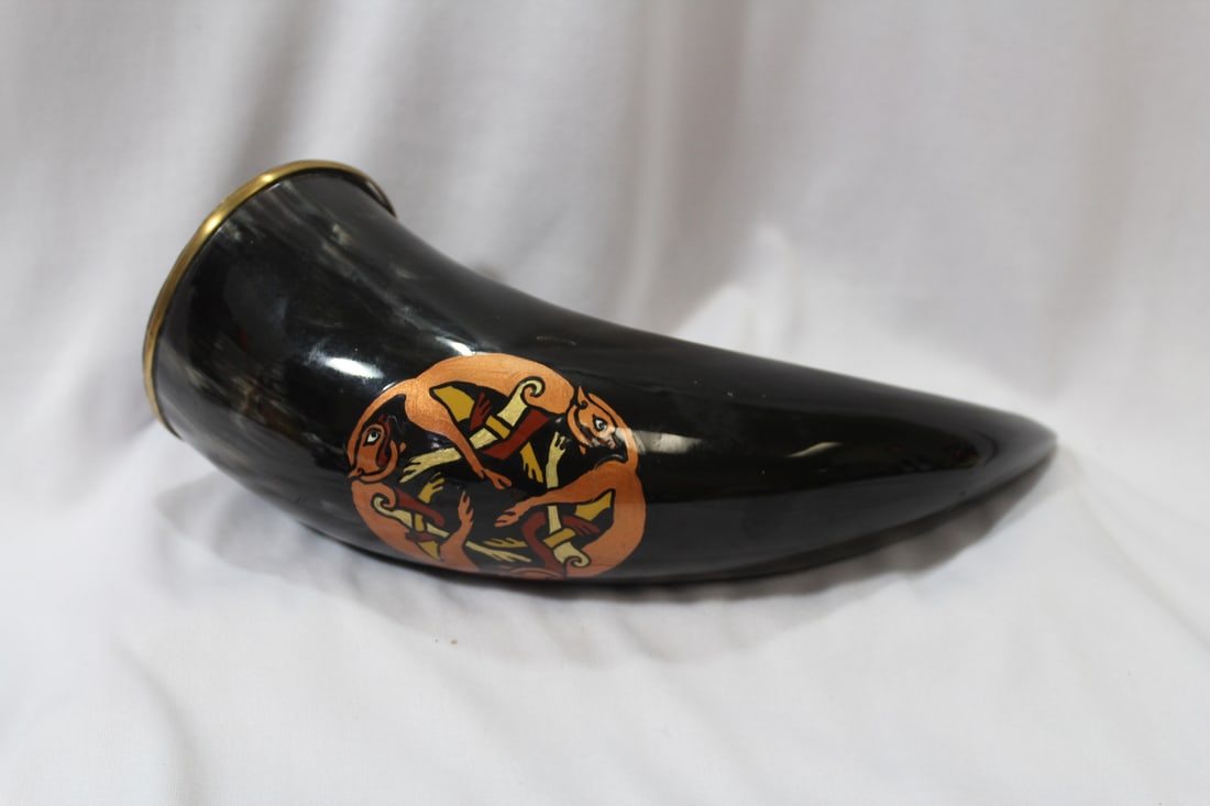 A Decorative Signed Horn: please note: band broke as shown - 11" long straight line measurement