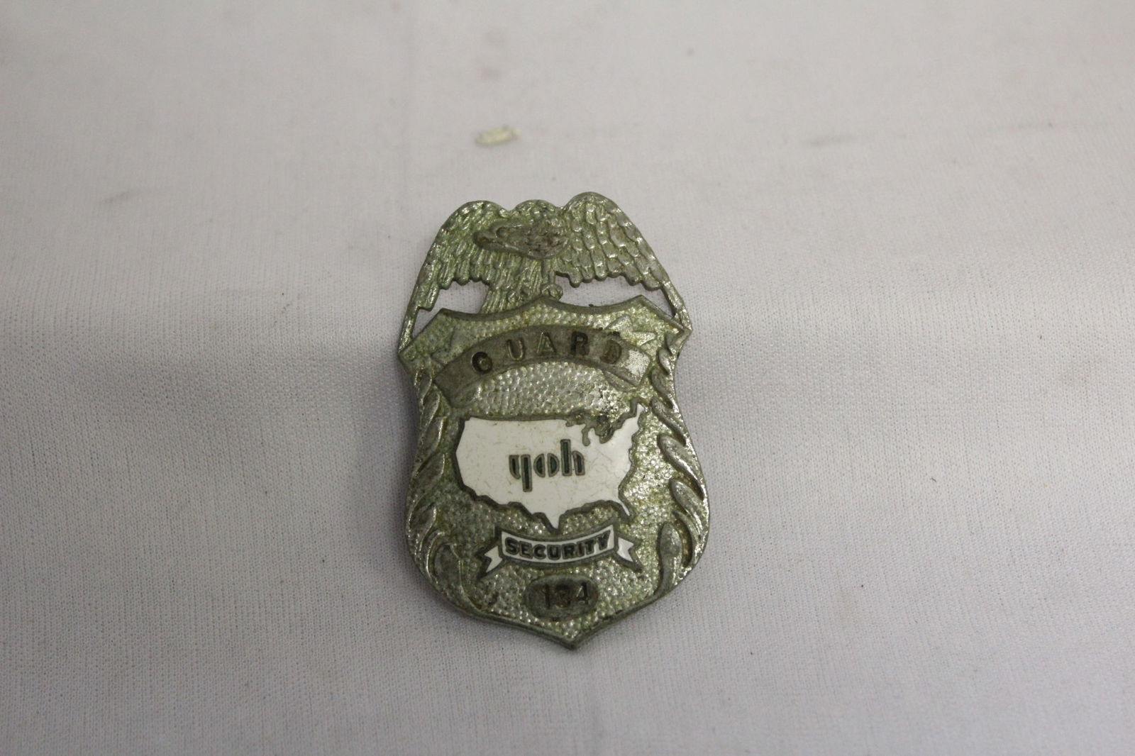 A Security Guard Badge: as shown