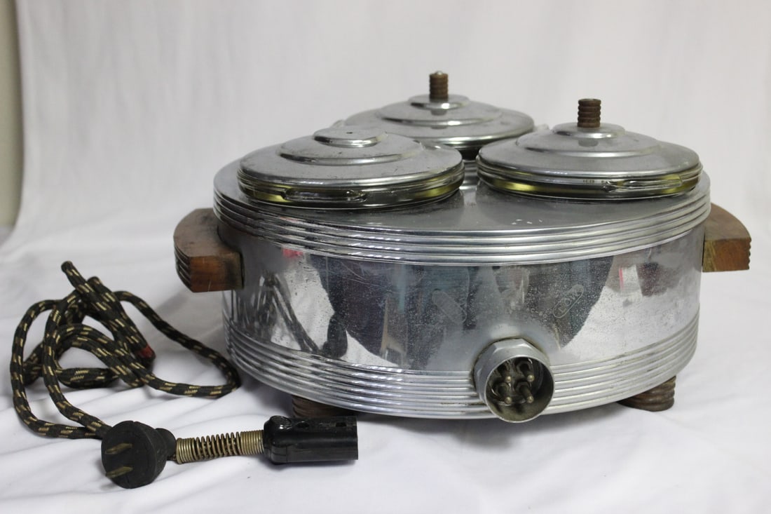 A Retro Crock Pot or Food Warmer: it is not tested, to see if it works or not - please note: missing one finial