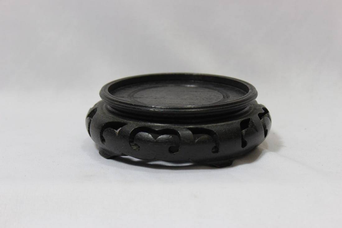 An Asian Wood Stand: carved - inside diameter= 3"