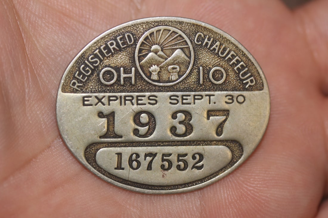 A 1937 Chauffeur Badge: as shown