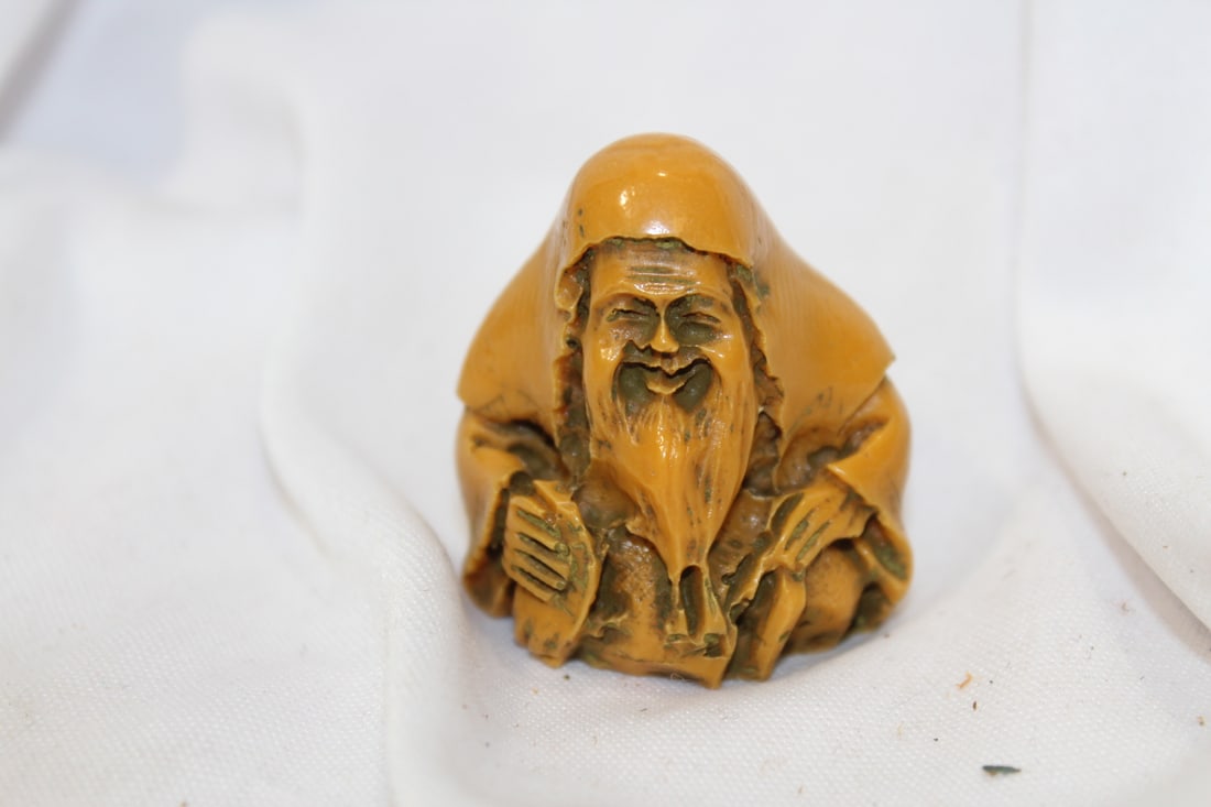 A Vintage Japanese Resin Figurine: 1 1/2" across