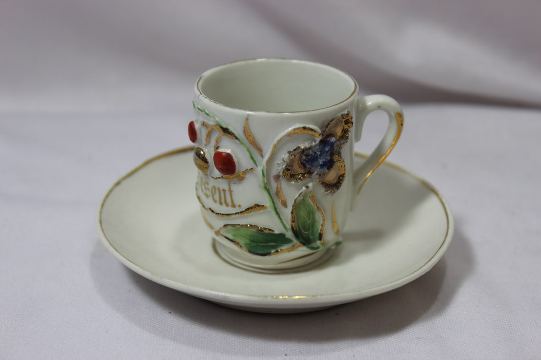 A Vintage Cup and Saucer: cup= 1 3/4" tall
