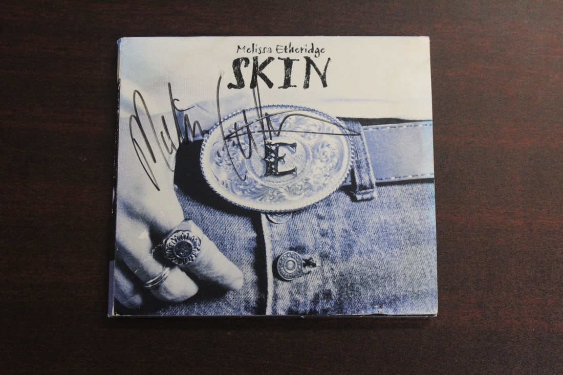 A Signed Melissa Etheridge Skin Cd: as shown 