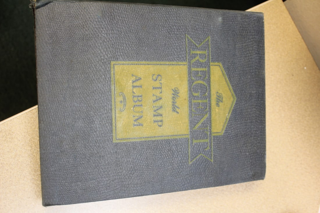 The Regent World Stamp Album: mostly empty, some stamps 
