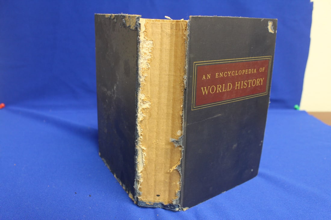 Hardcover Book: Encyclopedia of World History: please note: middle binding cloth is missing 