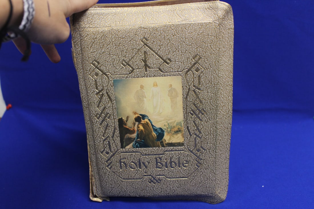 Hardcover Book: The Holy bible: as shown 