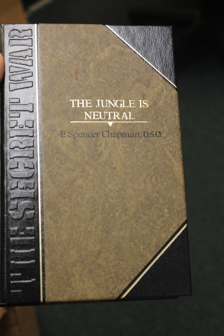 Hardcover Book: The Jungle is Neutral: as shown 