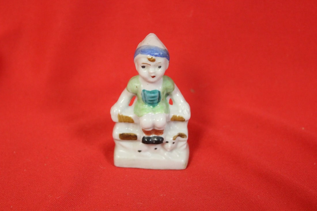 A Japanese Figurine: 3 inches tall