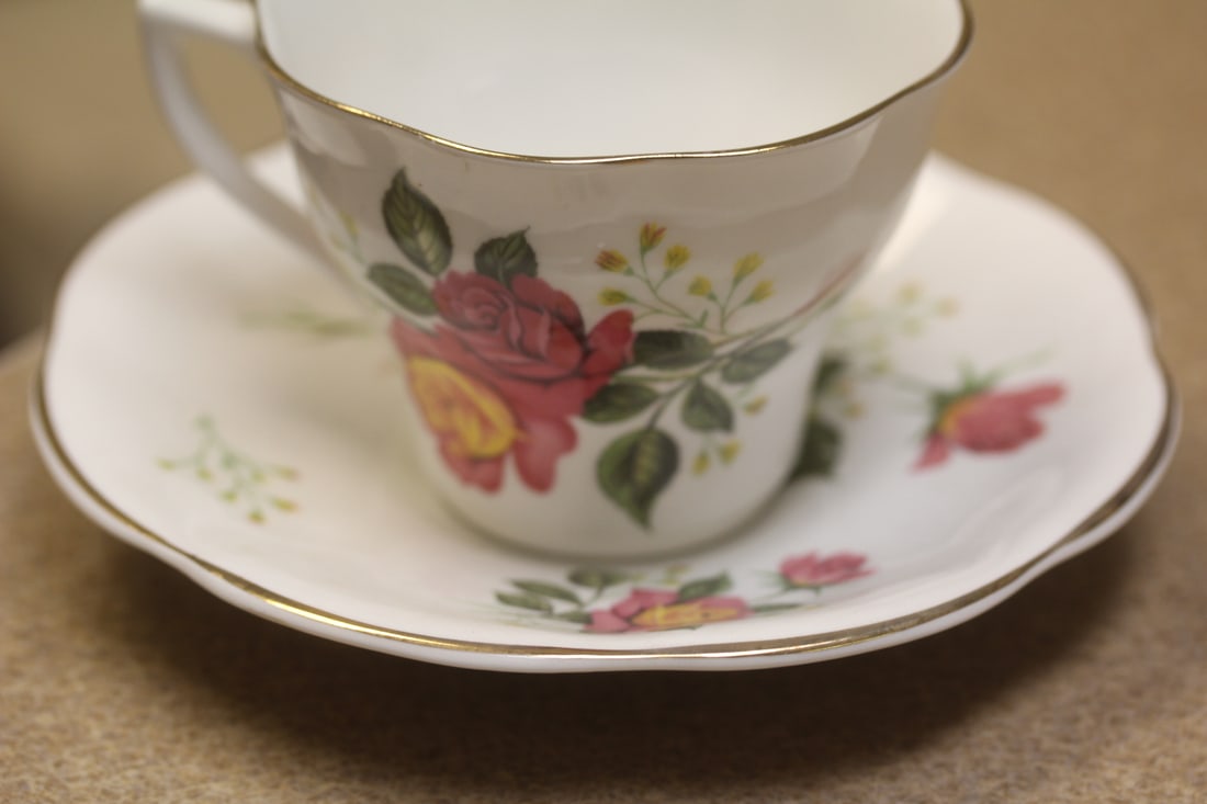 Crownford Bone China Cup and Saucer: cup= 2 1/2" tall