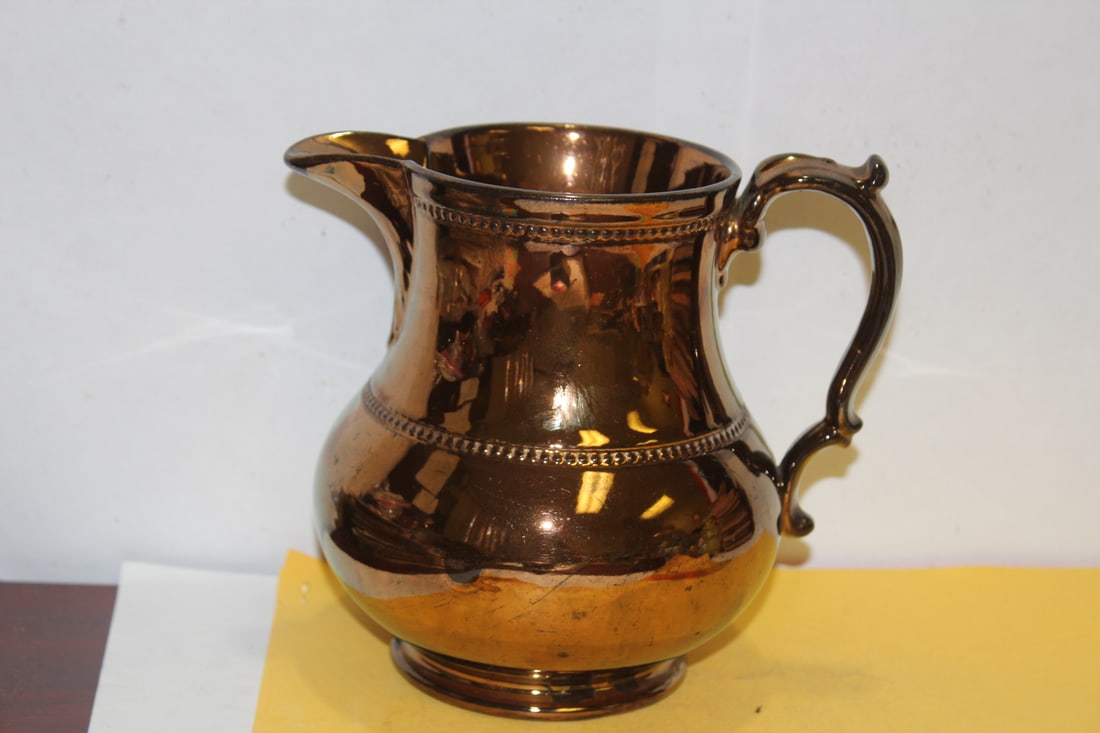 A Ceramic Lusterware Pitcher: 6" tall