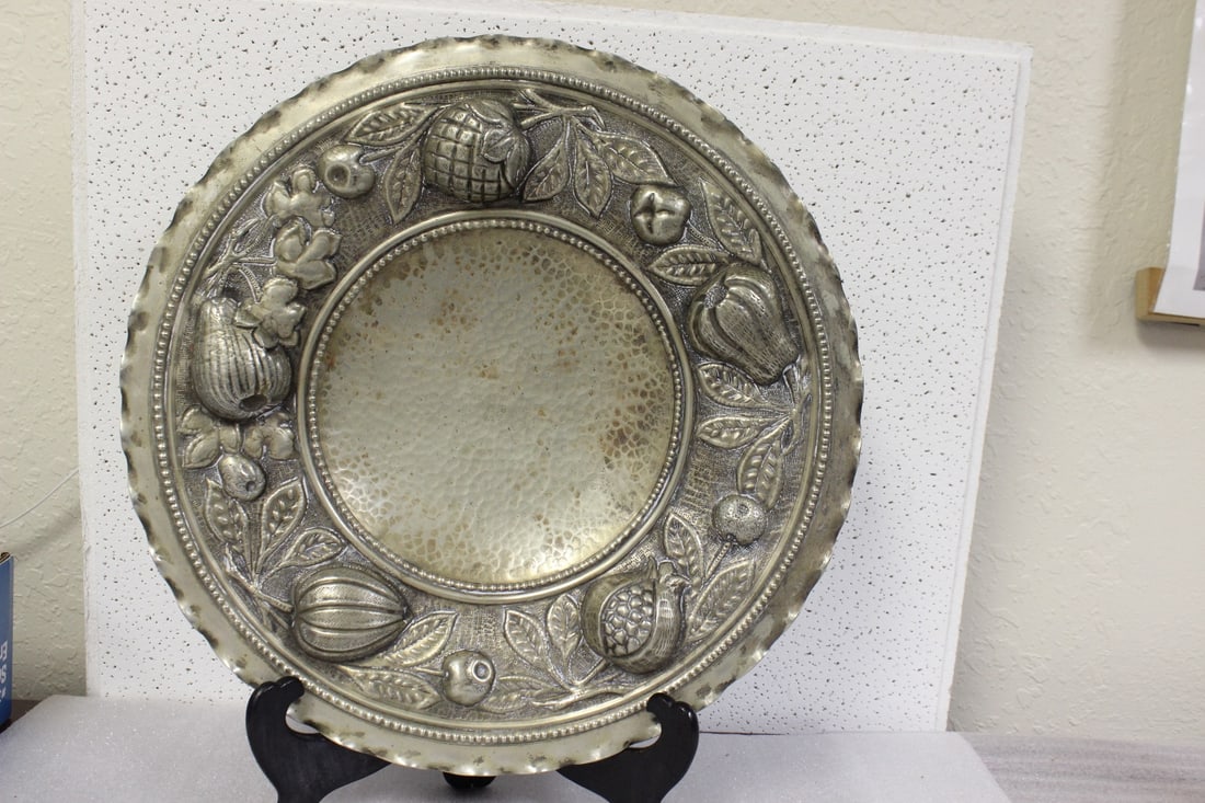 A Hand Hammered Charger: 15 3/4" indiameter